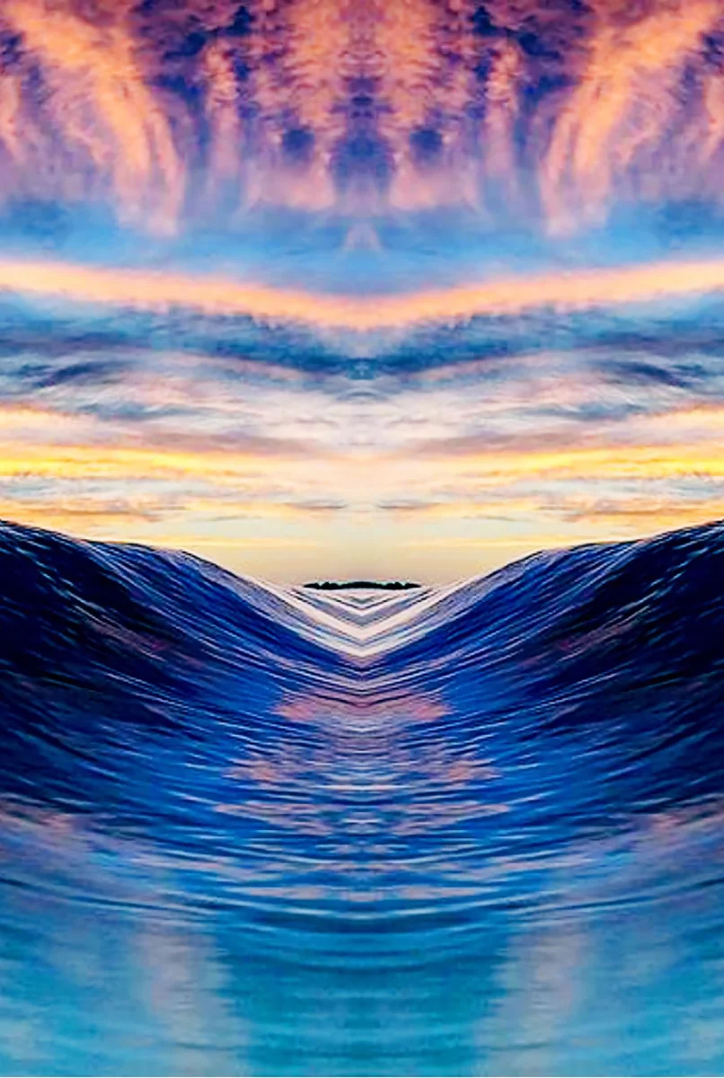 Digitally manipulated photo, abstracted. The photo is horizontally mirrored. Below a colorful and partly cloudy sky at sunrise, ocean water is beginning to rise as a wave.